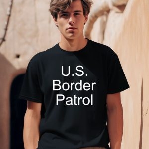 Michael Harriot Wearing Us Border Patrol Shirt